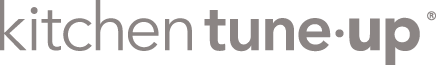 Grey text logo stating Kitchen Tune-Up. 